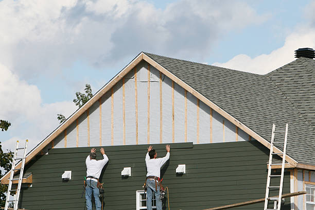 Professional Siding technician working in Liberty, NC